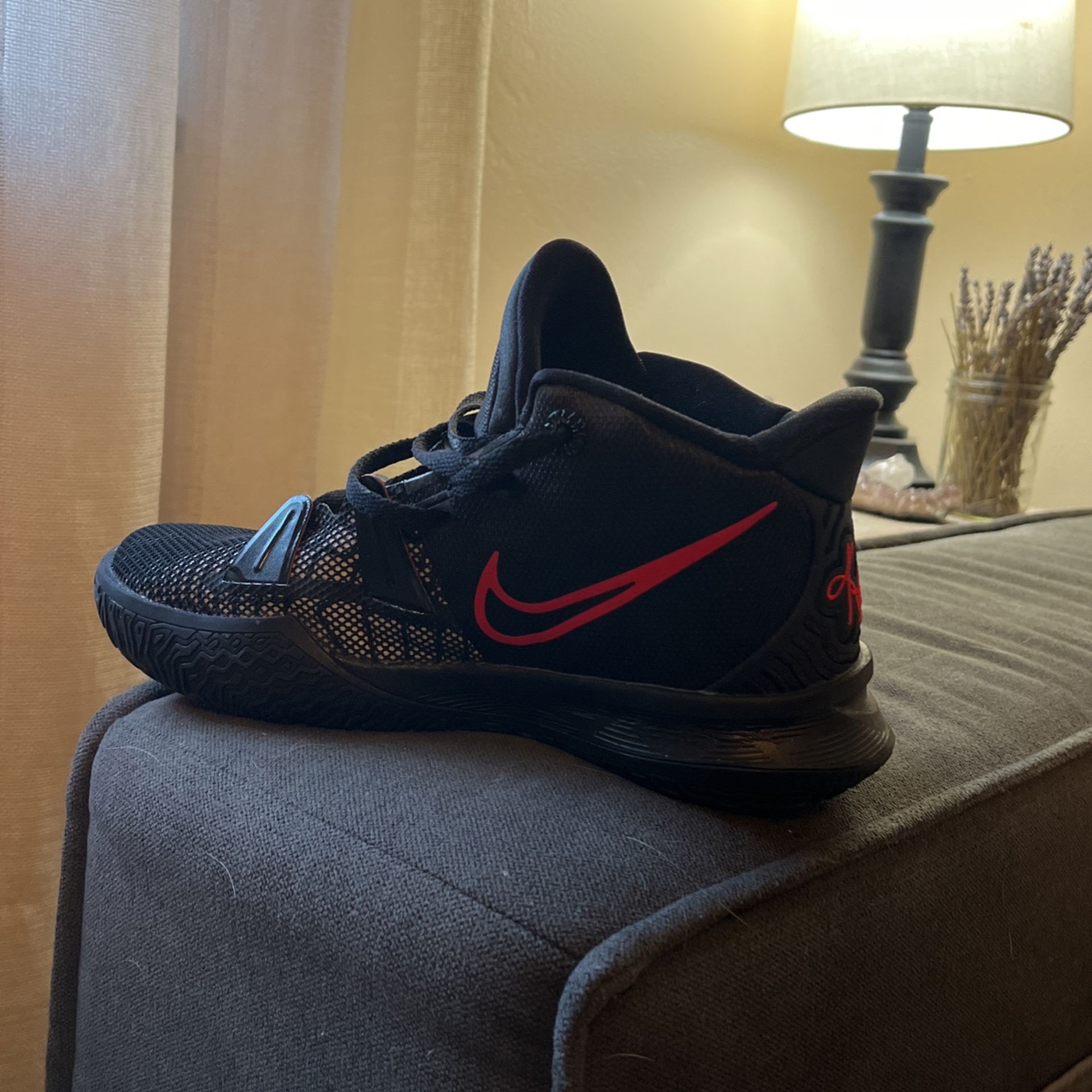 Kyrie 5.  Black.  Size 5.5