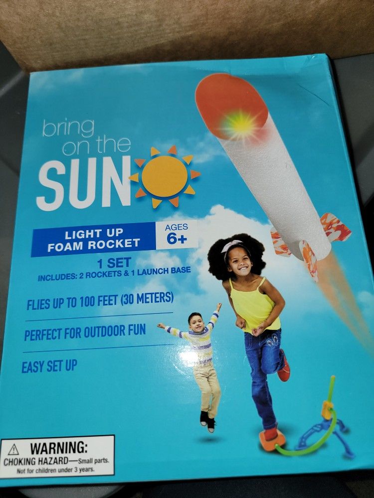 NEW LIGHT UP FOAM ROCKET.  INCLUDES 2 TICKETS AND LAUNCHING BASE. FLIES 100 FT UP. AND LIGHTS UP