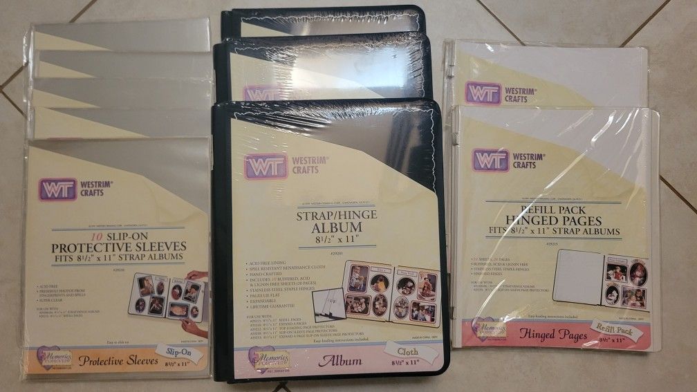 6 new scrapbooks with extra pages and protectors 
