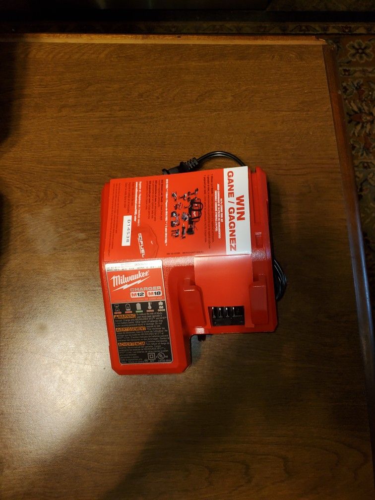 Firm. Firm. Milwaukee M18 M12 Charger.