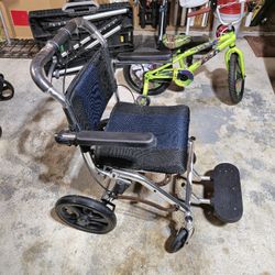 Ultra Light Weight Folding Wheel Chair. Only Used In Excellent Condition 
