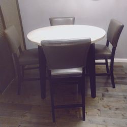 Granite Table Top With Espresso Wood With 4 Gray Chairs