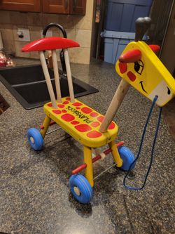 Playskool antique circa 1960s wooden ride-on giraffe riding toy