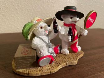 Vintage 1990's porcelain coca cola polar bear cubs and porcelain polar bear on snowmobile like new located in palm springs ca excellent