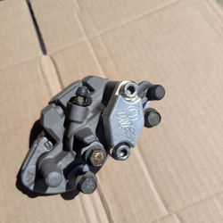Good used Yamaha rear brake caliper.