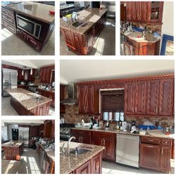 Midcentury modern chrome and mirrored glass credenza with a black granite top