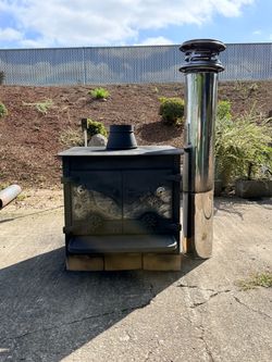 Cast Iron Wood Burning Stove with Stainless Steel Flue Pipe