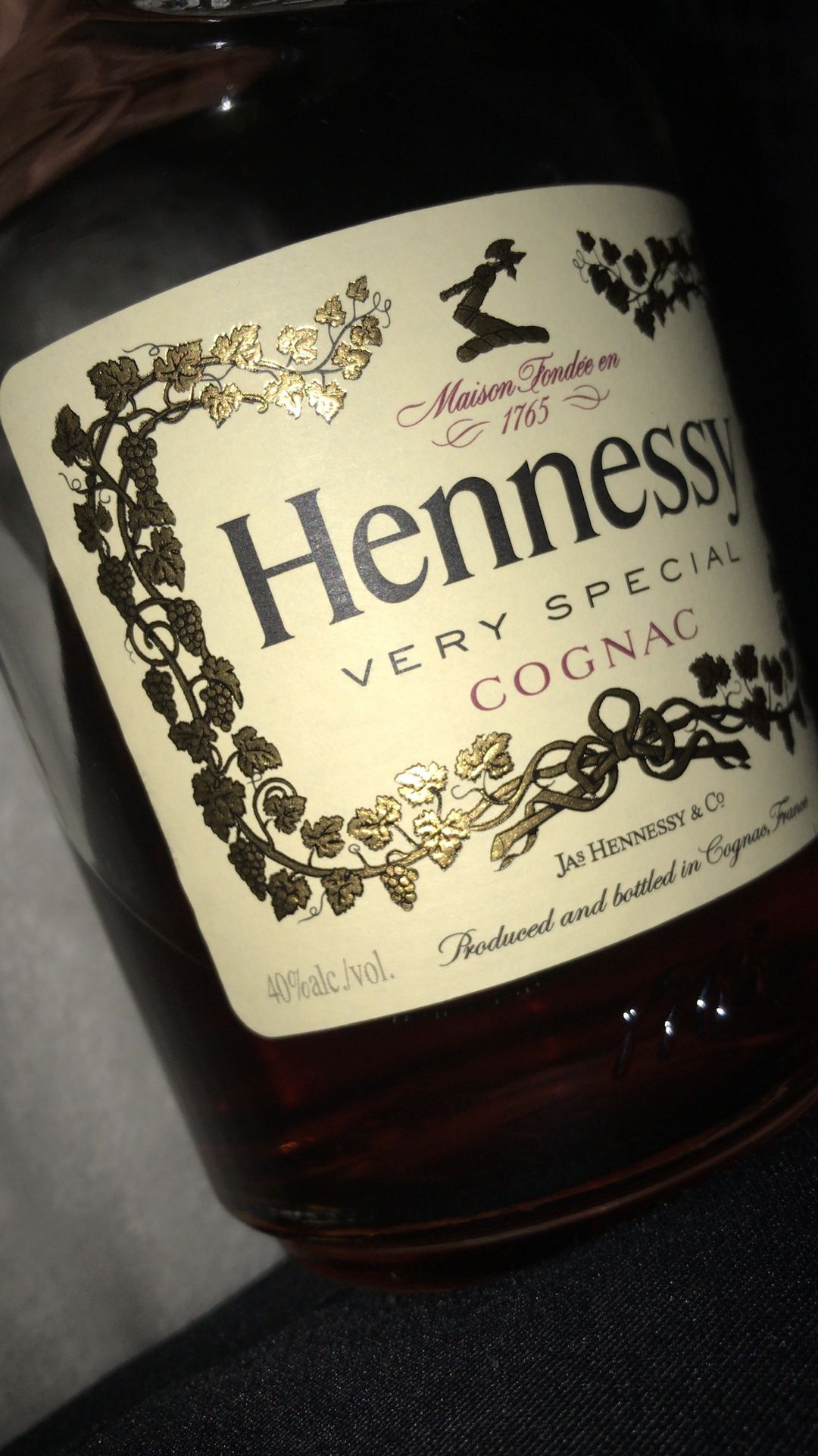 Henessy bottle picture signed by owner