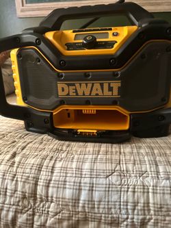 Bluetooth DeWalt radio still looks new. Had it put away in the closet probably used it one time.