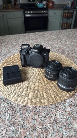 Canon EOS r100 Mirrorless Camera with Lenses and Cage