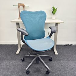 HERMAN MILLER MIRRA 2 CHAIR, BUTTERFLY SUSPENSION BACK WITH ADJUSTABLE BACK SUPPORT! CHAIR COMES WITH BRAND NEW HARDWOOD FLOOR CASTERS 
