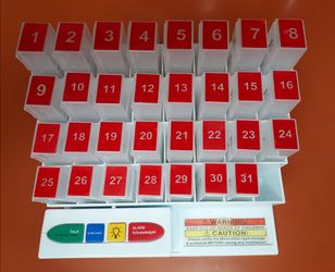 Pill container with clock