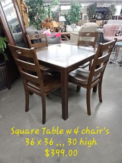 Table w4 chairs We are located at 2811 East Bell road. Another Time Around Furniture.