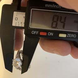 2.5 Karat Center Stone! Round, VS1, D-E Color, also has 3 Small Bouquets, and 24 smaller bouquets. Set in 22K solid gold.