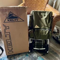 Vintage NEW IN BOX KELTY External Frame Hiking Mountain Backpack Olive Green w/camp gear in pockets.  Brand new snakebite kit in pockets, new extra ba