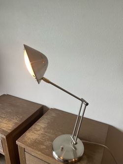 Adjustable lamp with light dim adjustment