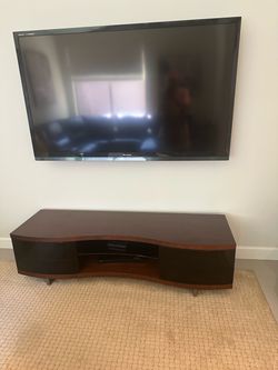 75" Sharp Tv w/wood entertainment cabinet