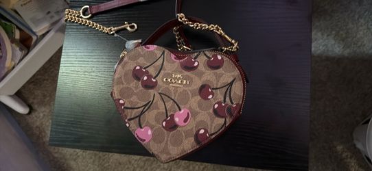 HEART CROSSBODY BAG IN SIGNATURE CANVAS WITH CHERRY PRINT