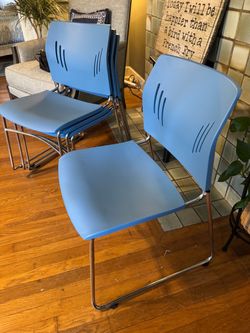 Blue Plastic Stackable Chairs with Chrome Frame