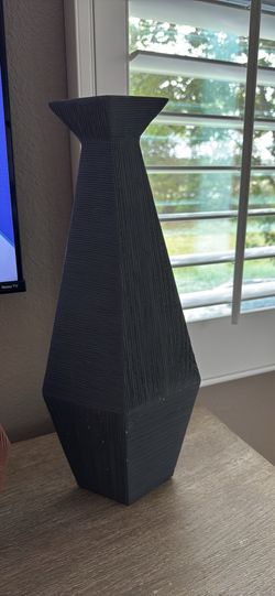 3 clay vases