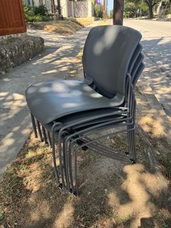 4 Stackable Grey Chairs