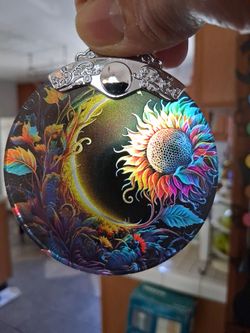 Sunflower  clear glass ornament.