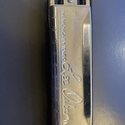 Two Harmonicas With Holder