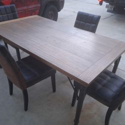 4 Leather Chairs And Table 