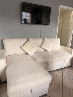 Cream Sofa w/ Storage + Pull-Out Bed