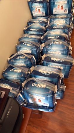 32 packs of Comfees DriNite premium youth pants L/XL 60- 125 + Lbs 27 -57 +kg  13 youth pants per pack  Pick up or meet up ⬆️ in Powder Springs Ga 301