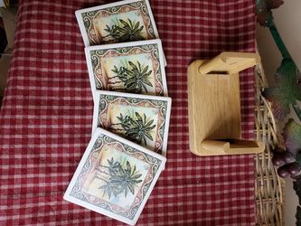 Nice ceramic and wood coaster set.