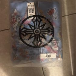 we are righteous risen king blue cropped zip up 