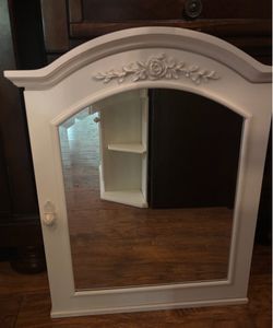 Mirrored wall storage cabinet