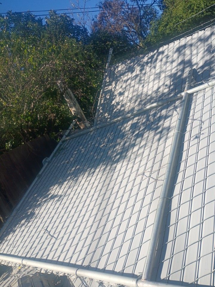 Two Rolling Gates . 6 Ft High With Privacy Slats