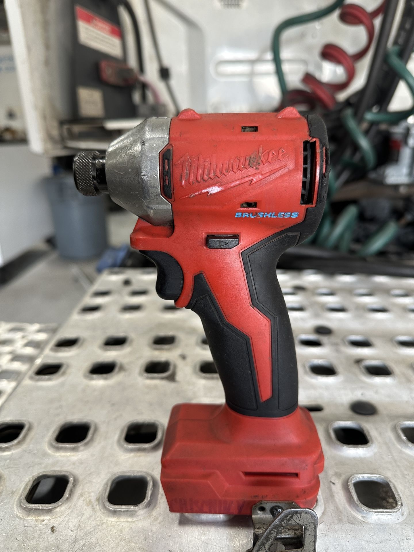 Milwaukee M18 Brushless 1/4" Hex Impact Driver. 
