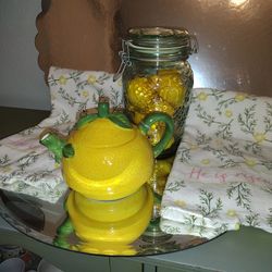 4, Pieces, Jar Filled, With  Lemon's, Lemon Tea Pot, And 2 Kitchen, Towels.