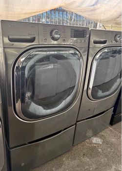 LG Washer & Dryer w/pedestals