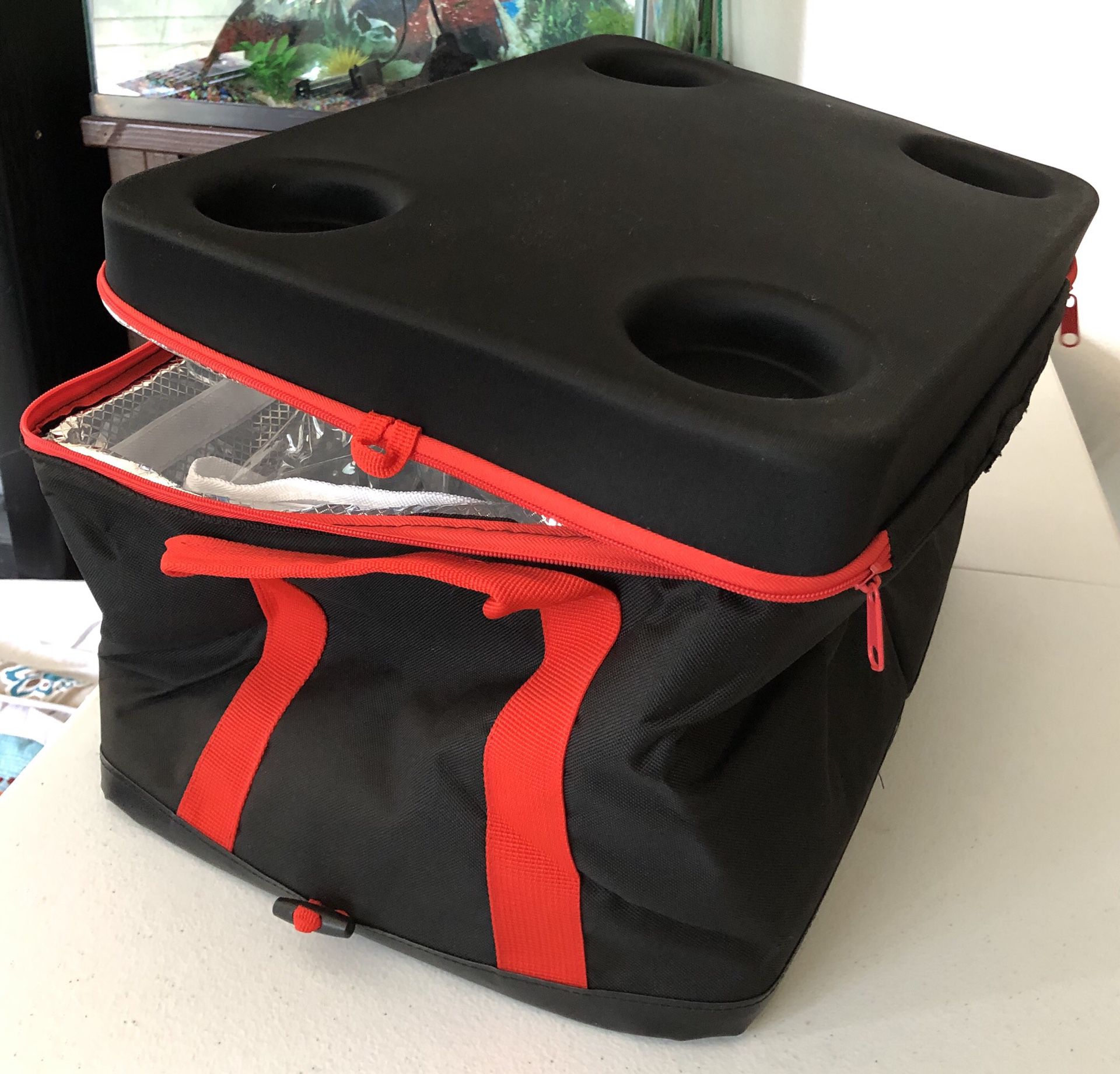 Foldable cooler with 4 cup holder. Never used.