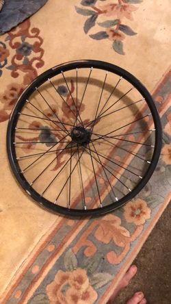 USED BLACK BIKE FRONT WHEEL, 28 SPOKES 16” WITH CENTRAL AXLE