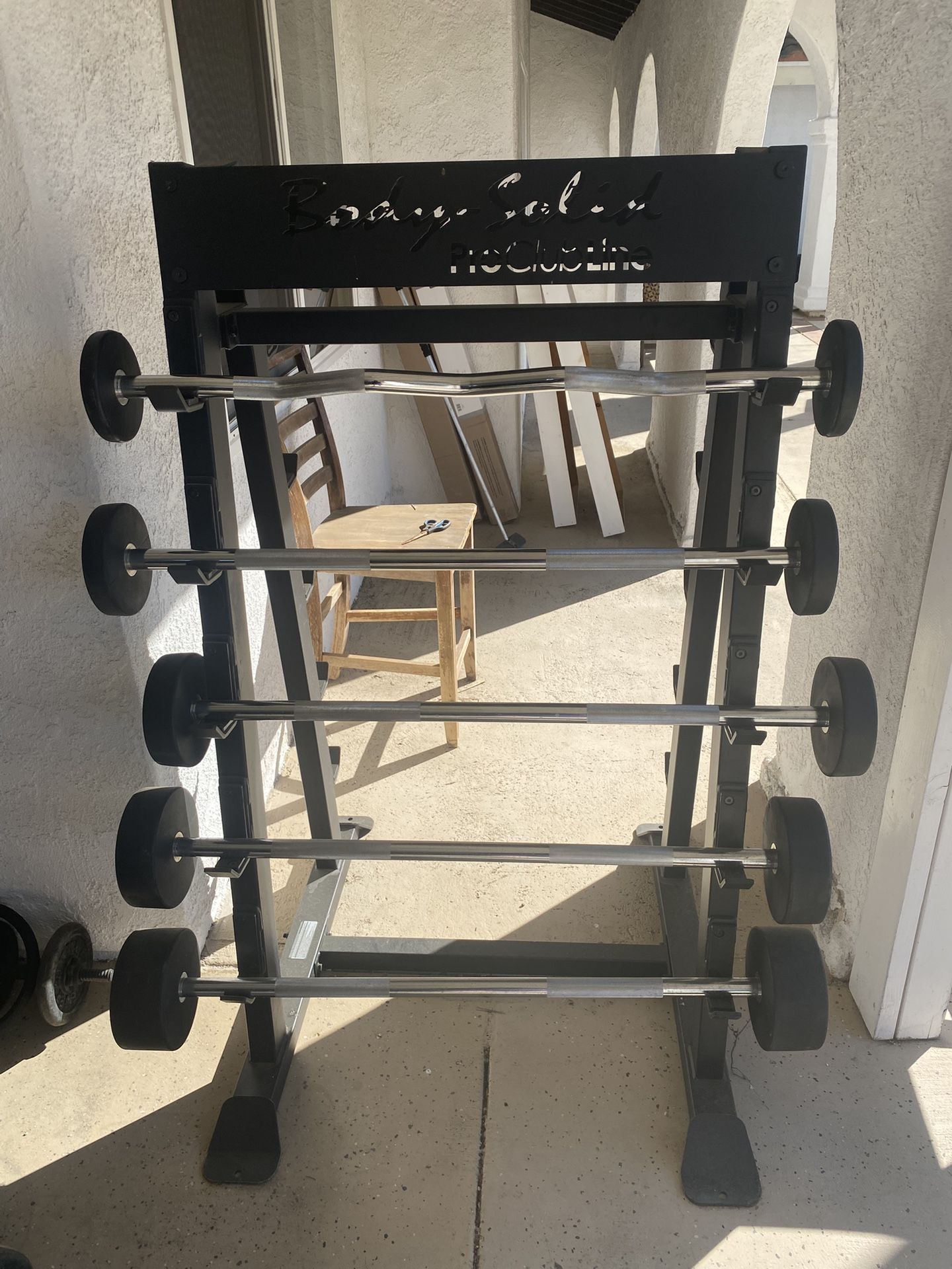 Barbell Rack And 4 Barbells