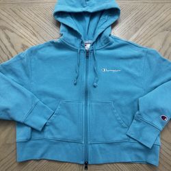 Champion women's cropped fleece zip-up sweatshirt in teal blue. Size medium 