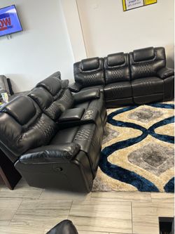 Limited time sale. Santiago black leather reclining sofa and loveseat set only $999. Easy finance option. Same-day delivery.