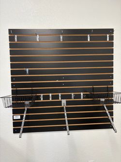 Black Slatwall Display Panel with Hooks and baskets