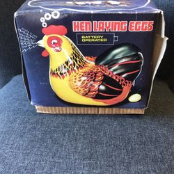 Vintage Hen Laying Eggs Tin Toy 