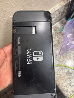 Nintendo Switch with Gray Joy-Con Controller (Previous Model)