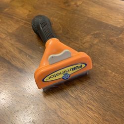 Dog deshedding tool