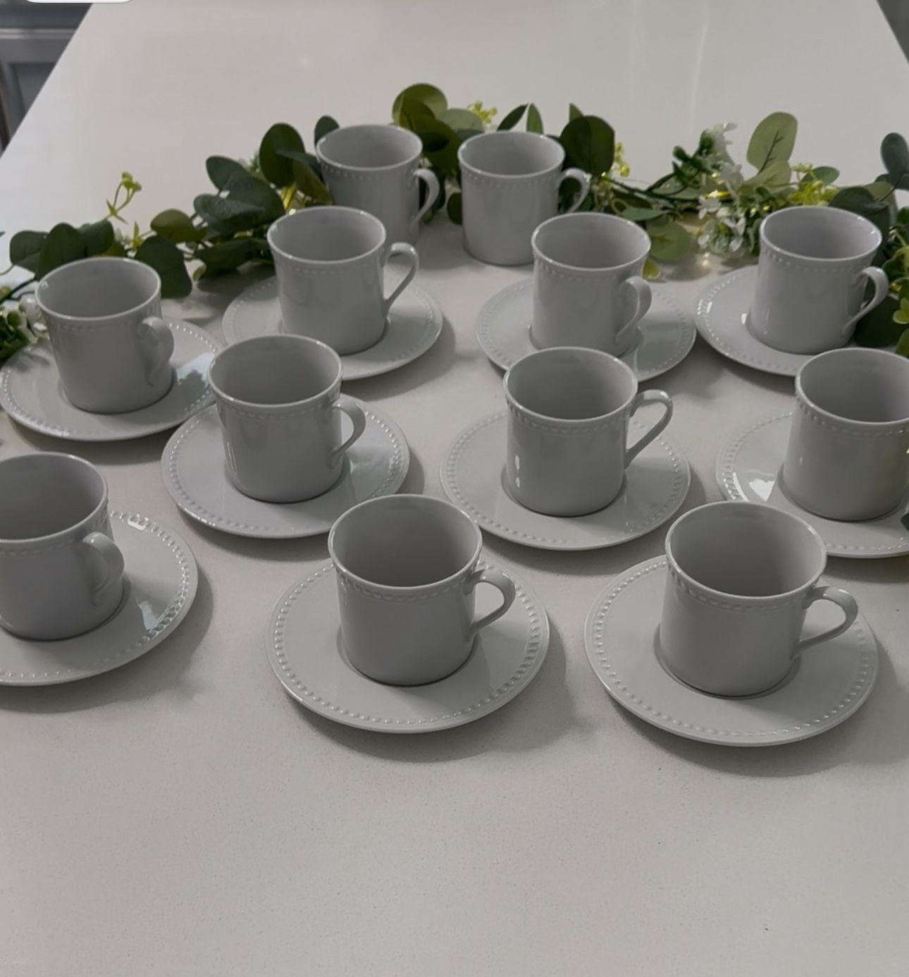 White tea set 22 pieces set JCPenney home collection: 12 cups and 10 small plates. No cracks no chips like new condition.