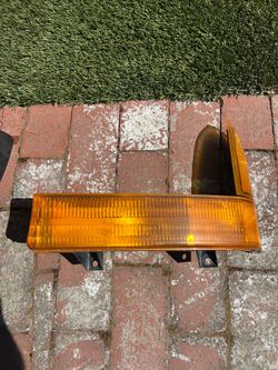 Pair of Amber Turn Signal and Corner Light Assemblies for a crown Vic 2000-2011.