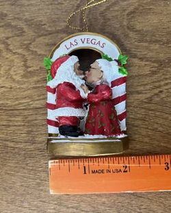 Santa and Mrs Claus Kissing In Front Las Vegas Arch Christmas Ornament
