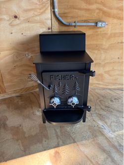 Fisher “mama bear” wood stove (have delivery)